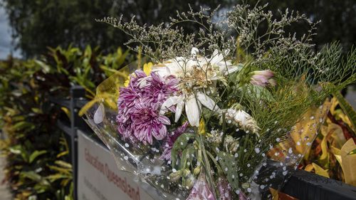 A floral tribute for a three-old-boy who died in a daycare mini-bus.