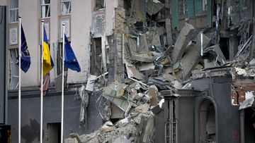 A damaged hotel at the scene of Russian shelling in Kyiv, Ukraine, Saturday, Dec. 31, 2022.