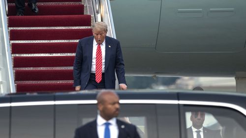 President Donald Trump arrives on Air Force One at Joint Base Andrews on Thursday.