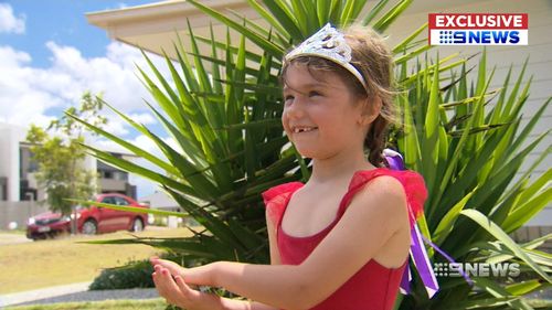 Alyssa, 5, was left on a bus for hours and banged on the windows to get out. (9NEWS)