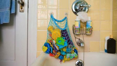 Store kids' bath toys in a mesh container that can be hung over the tap (Thinkstock)