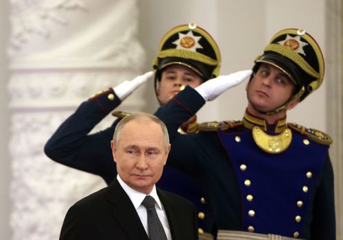 Russian President Vladimir Putin leaves the Grand Kremlin Palace 