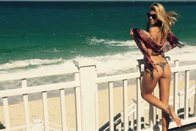 Charlotte proves it's still 'Year of the Booty' with this perky butt snap!