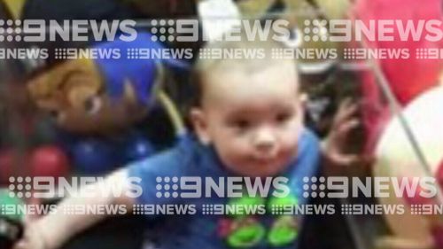 One-year-old Lewis climbed into an Adelaide skill-tester. (9NEWS)