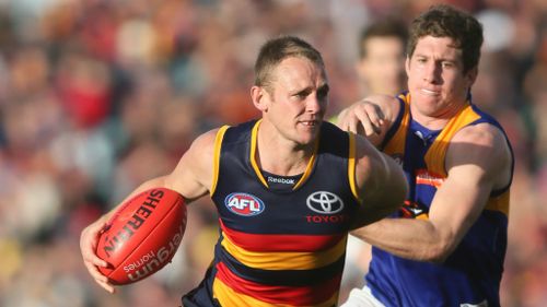 Crows defender Brent Reilly evades West Coast's Patrick McGinnity last year. (AAP)