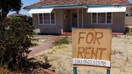 A handwritten for rent sign.