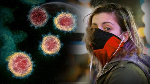A woman wears a protective mask as COVID-19 outbreak spreads around Australia and the world.