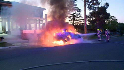 The car erupted into flames on Welsford St, Merrylands.