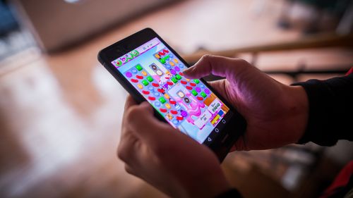 A woman who defrauded her mushroom farm employer of more than $1 million, spending $180,000 on the mobile game Candy Crush, has pleaded guilty to theft and had her bail revoked.