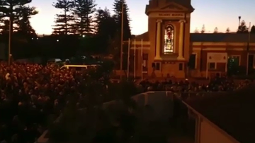 A man has been charged after allegedly carrying an axe at an Anzac Day dawn service in Adelaide.