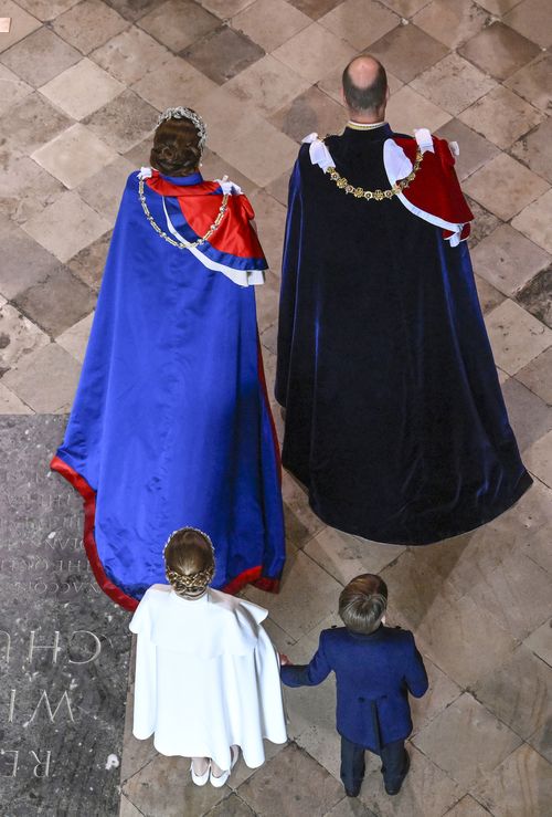 Catherine, Princess of Wales, Prince William, Prince of Wales, Princess Charlotte of Wales and Prince Louis of Wales during the Coronation of King Charles III and Queen Camilla on May 06, 2023 in London, England. 