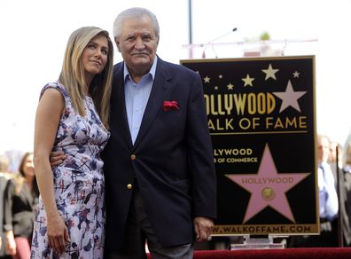 Actress Jennifer Aniston, left, poses with her father, actor John Aniston, after she received a star on the Hollywood Walk of Fame in Los Angeles on Feb. 23, 2012
