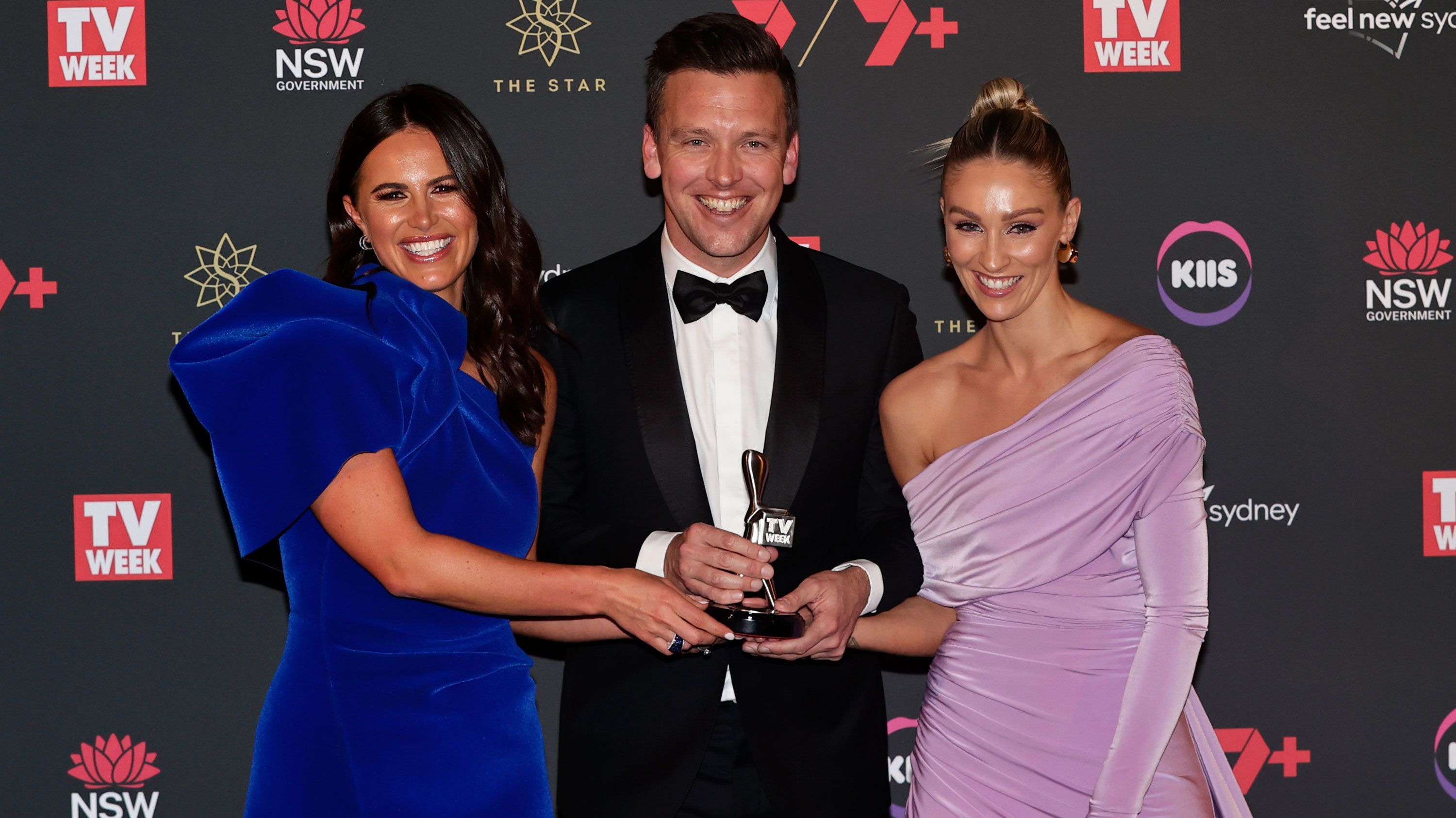 Wide World of Sports personalities Danika Mason, James Bracey and Allana Ferguson hold the logie presented to Nine for Most Outstanding Sports Coverage.
