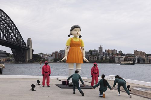 A huge 'Squid Game' doll has popped up at Sydney Harbour.
