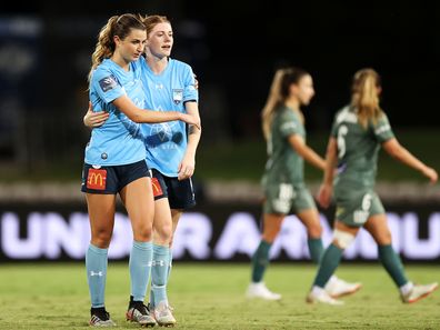 Charlotte McLean and Cortnee Vine of Sydney FC celebrate securing a draw to force extra time during the A-League Womens match between Sydney FC and Melbourne City at Netstrata Jubilee Stadium, on March 11, 2022, in Sydney, Australia. 