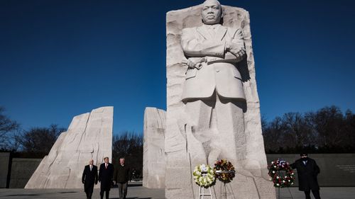 President Trump made an unannounced visit to the Martin Luther King Jr memorial in Washington on the national holiday honouring the civil right leader