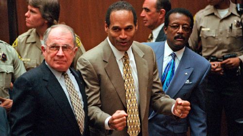 OJ Simpson reacts as he is found not guilty of murdering his ex-wife Nicole Brown Simpson and her friend Ron Goldman in 1995 (Myung J. Chun/Daily News via AP, Pool, File). 