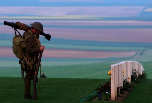 A military re-enactor at the Australian National Memorial in Villers-Bretonneux, northern France. More than 60,000 Australians died in bitter fighting during World War I.