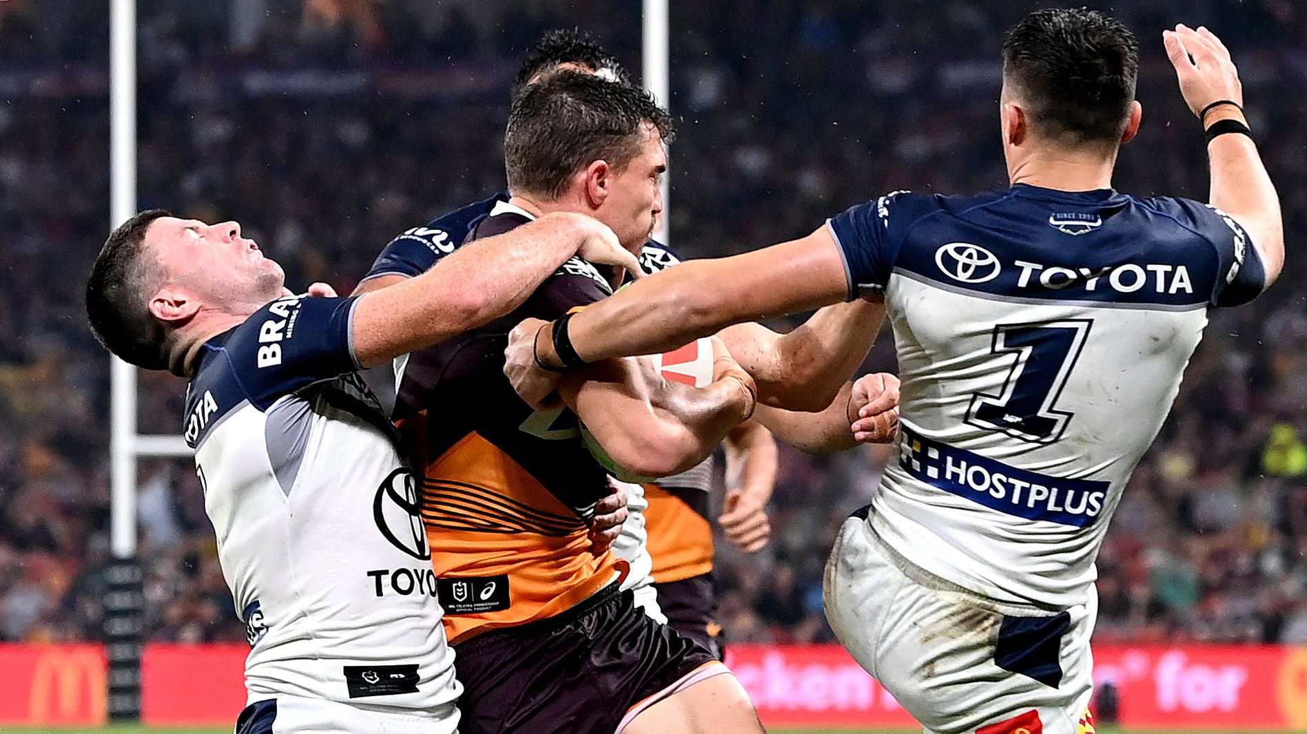 Corey Oates of the Broncos is tackled during the round 2 NRL match between the Brisbane Broncos and the North Queensland Cowboys at Suncorp Stadium on March 10, 2023 in Brisbane, Australia. (Photo by Bradley Kanaris/Getty Images)