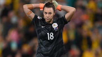 Mackenzie Arnold of Australia reacts after missing her team&#x27;s fifth penalty in the shootout against France.