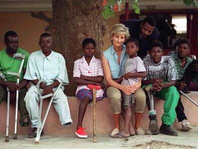 Diana, Princess Of Wales, With Children Injured By Mines At Neves Bendinha Orthopaedic Workshop In Luanda, Angola.  (Photo by Tim Graham Photo Library via Getty Images)