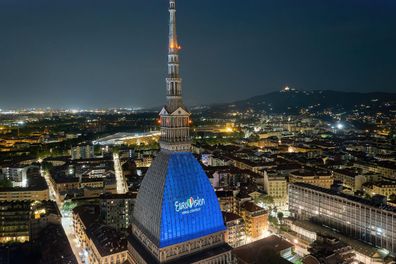 Eurovision Song Contest logo projected on the Mole Antonelliana. The 66th edition will be held in Turin in May 2022.