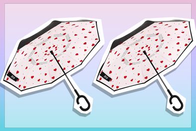 9PR: Reverse folding umbrella with heart print and C-shaped handle.