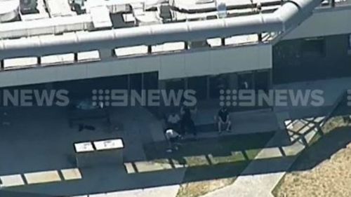 The youths allegedly used metal table legs to intimidate staff. (9NEWS)