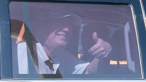 Donald Trump gives a thumbs up to supporters in Florida.