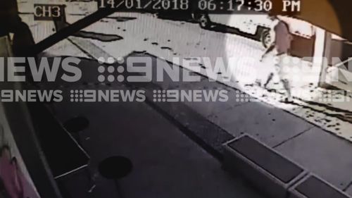 CCTV shows the altercation taking place. (9NEWS)