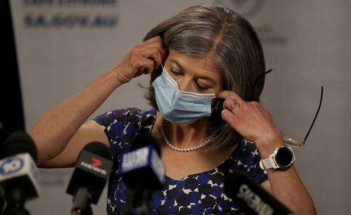 South Australia's Public Health Director Nicola Spurrier removes her mask during the daily COVID-19 update on November 18, 2020 in Adelaide, Australia. 