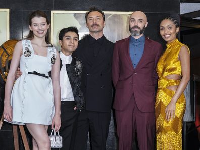 (L-R) Ever Anderson, Alexander Molony, Jude Law director David Lowery and Yara Shahidi pose for photographers upon arrival at the World premiere of the film 'Peter Pan and Wendy' on Thursday, April 20, 2023 in London. 