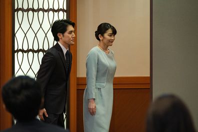 TOKYO, JAPAN - OCTOBER 26: Princess Mako (R), the elder daughter of Prince Akishino and Princess Kiko, and her husband Kei Komuro, a university friend of Princess Mako, leave a press conference after announcing their wedding at Grand Arc Hotel on October 26, 2021 in Tokyo, Japan. Princess Mako married Kei Komuro today at a registry office following a relationship beset with controversy following the revelation that Mr Komuros mother was embroiled in a financial dispute with a former fiancé. Foll