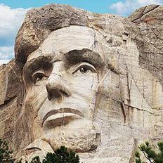 Sculpture of Abraham Lincoln's face on Mount Rushmore National Memorial (Getty)