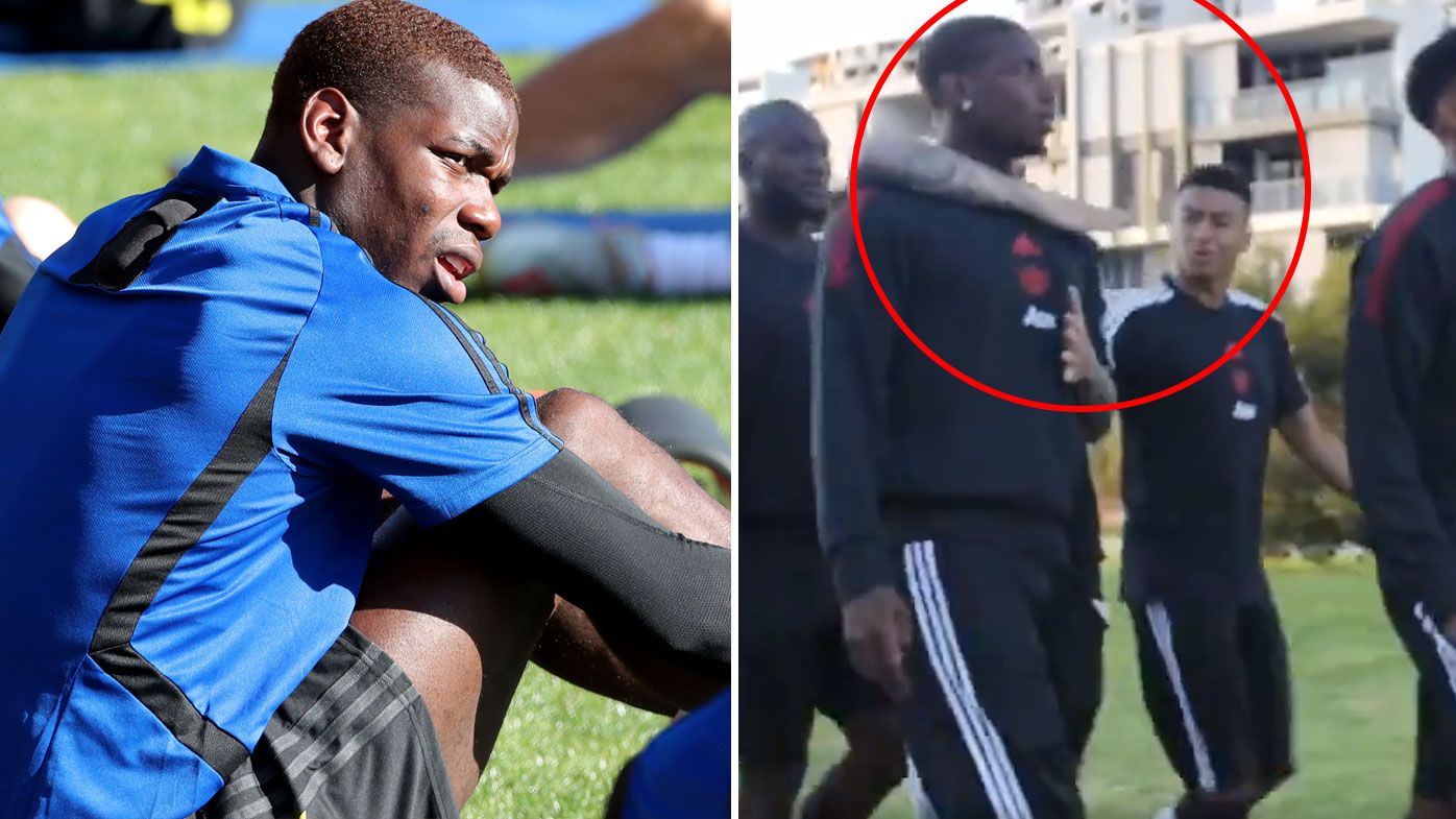 Paul Pogba gets into a disagreement with Jesse Lingard