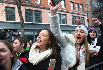 Patriots' fans lined the streets of Boston in their thousands.