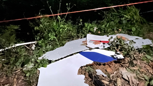 Debris is seen at the site of a plane crash in Tengxian County in southern China's Guangxi Zhuang Autonomous Region, Tuesday, March 22, 2022.