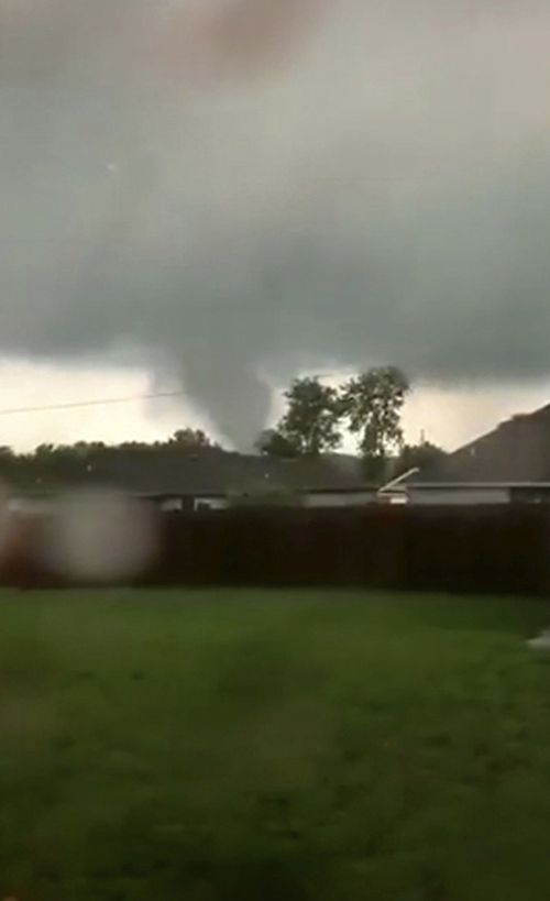 This still image taken from video provided by Shayla Brooks shows a tornado on Wednesday, May 22, 2019, in Carl Junction, Mo. The tornado caused some damage in the town of Carl Junction, about six kilometres north of the Joplin airport. (Shayla Brooks via AP)