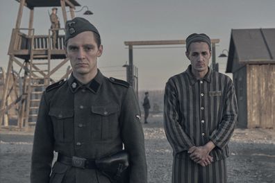 Jonas Nay as Nazi Officer Stefan Baretzki & Jonah Hauer-King as Lali Sokolovin in Stan series The Tattooist of Auschwitz.
