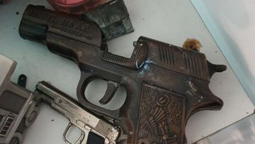 A firearm confiscated after police raids. 