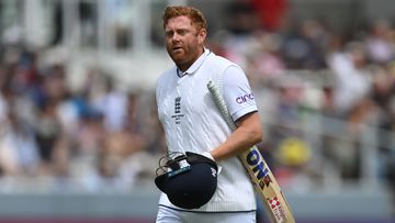 Jonny Bairstow of England leaves the field after being run out by Alex Carey of Australia during Day.