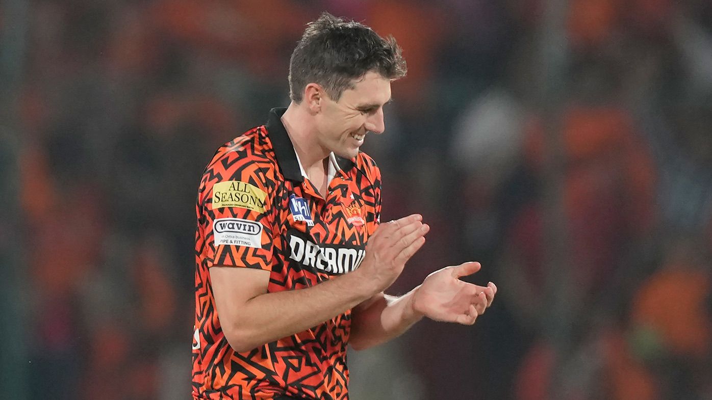 Sunrisers Hyderabad&#x27;s captain Pat Cummins celebrates the wicket of Rajasthan Royals&#x27; Dhruv Jurel during the Indian Premier League cricket match between Sunrisers Hyderabad and Rajasthan Royals in Hyderabad, India, Thursday, May 2, 2024. (AP Photo/Mahesh Kumar A.)
