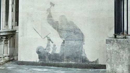 The removed Banksy artwork in London Queen's Building, in the Royal Courts