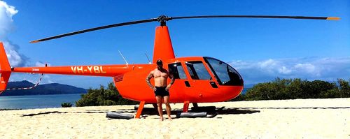 Mr Fornaciari posted this photo of himself on a beach with a helicopter. (Facebook)