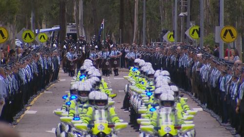 Guard of honour through Brisbane streets for Queensland police officers Constables Rachel McCrow and Matthew Arnold.