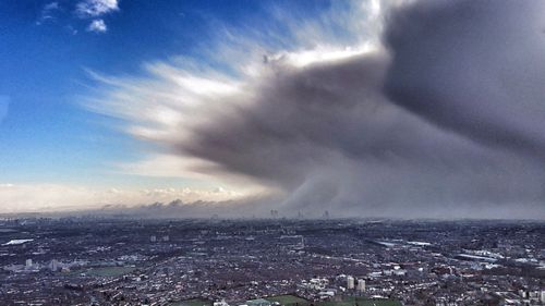 The Arctic storm towers over London on Tuesday. (AP).