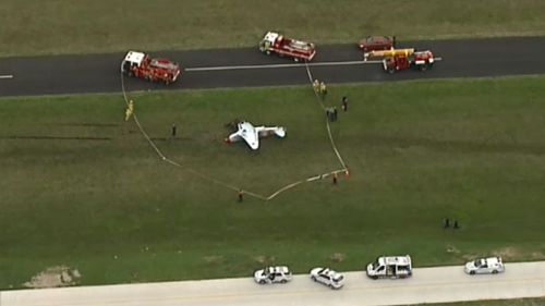 Investigators believe the plane flipped when the plane's wheels got caught in soft grass. (9NEWS)