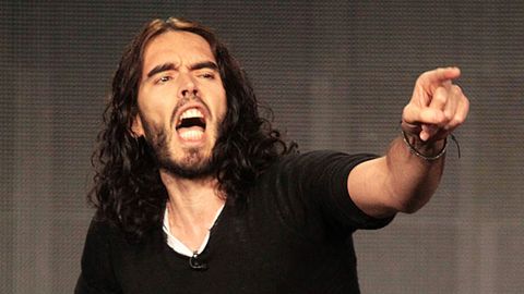 Russell Brand under investigation for throwing photographer's phone through a window