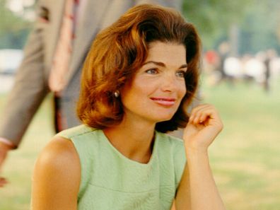CIRCA 1960s:  Former First Lady Jacqueline Kennedy enjoys herself at a picnic circa the 1960s.  