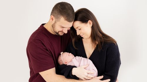 Clayton and Jemma James with their daughter Ella.